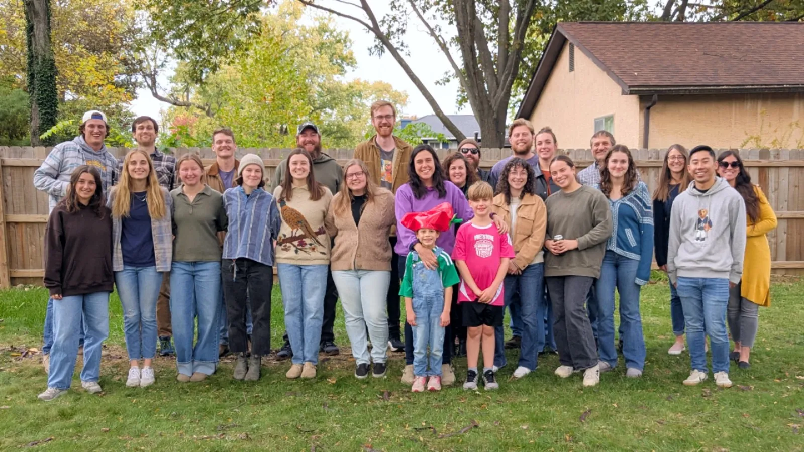 Posed group of AELers in the backyard at the Chili Cookoff