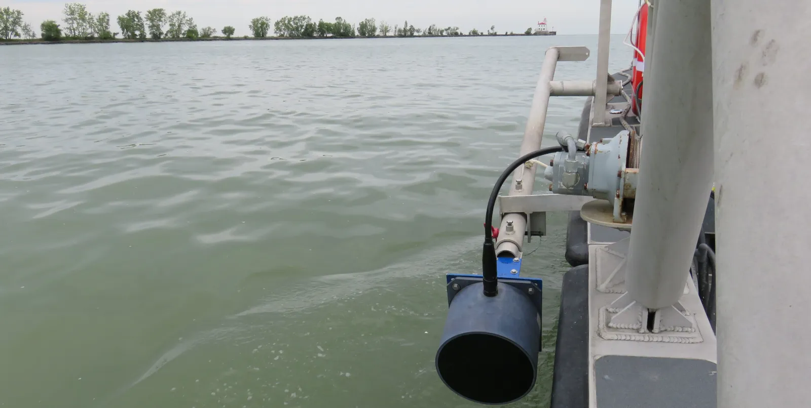 Hydroacoustic transducer mounted to boat on Lake Erie
